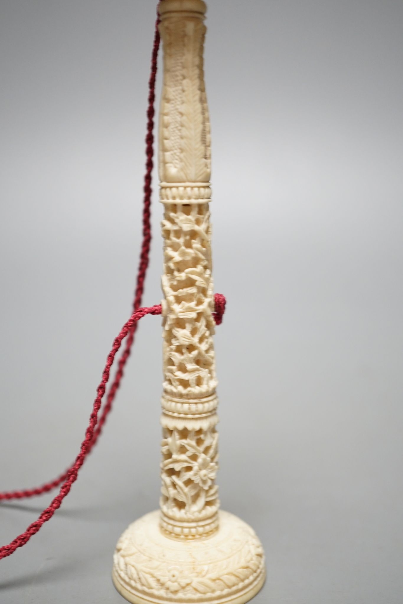 A Chinese export ivory spike and ball game, 16.5cm, and an ivory snuff bottle